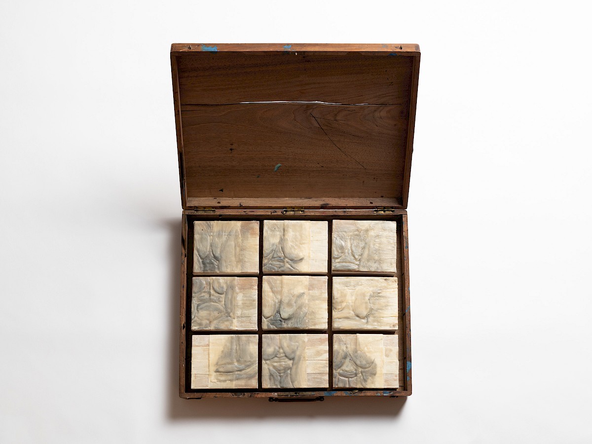 old paintbox out of wood, nine little boxes out of wood with reliefs out of cloth, beeswax and charcoal